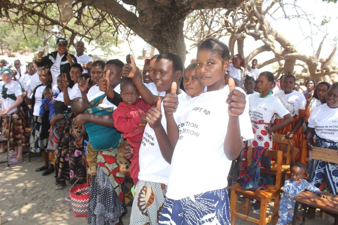 Teen mothers giving thumbs up at the Ivuna launch