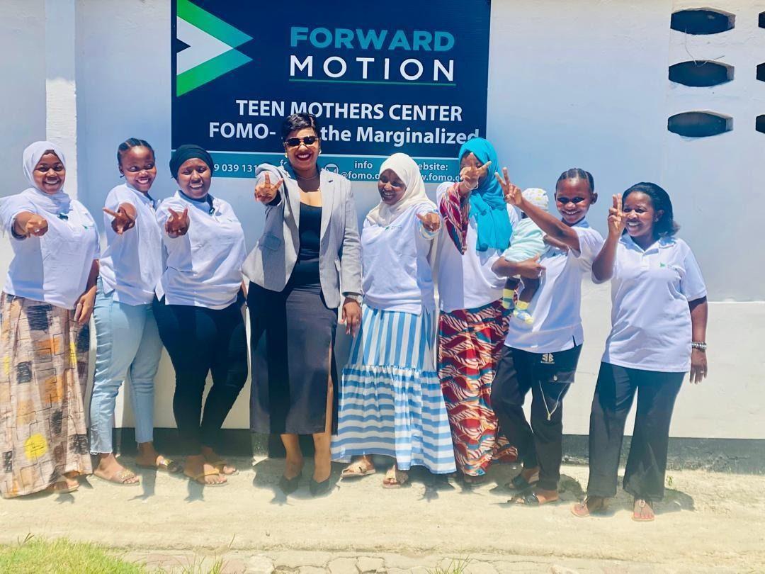 Teenage mothers outside a FOMO Initiative Teen Mothers Centre